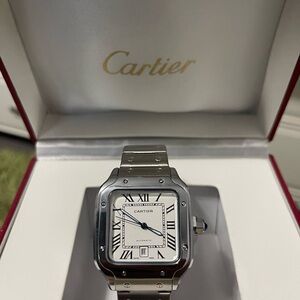 Cartier Silver and White Timepiece